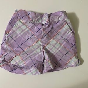 Janie and Jack purple pattern baby girl shorts.